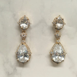 AD428 ARETES DORADOS OVALO-GOTA