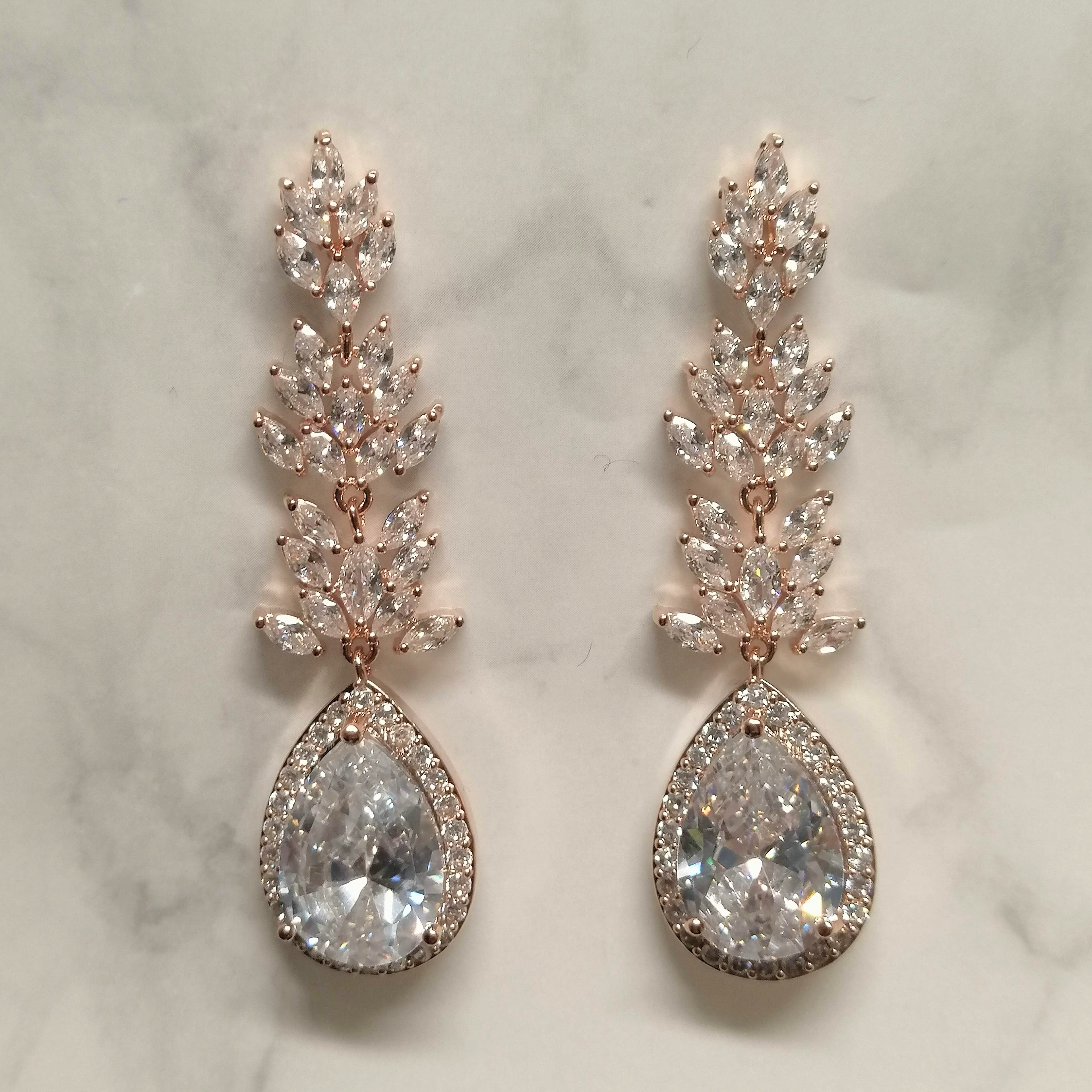 AR558 ARETES ROSA MARQ CON GOTA LARGA